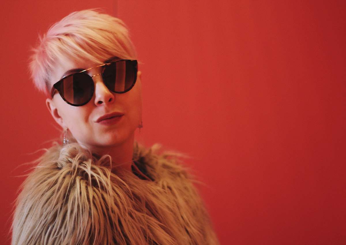 person woman wearing brown fur coat accessory