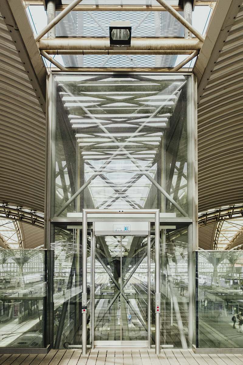 belgium gray metal building with glass walls canopy