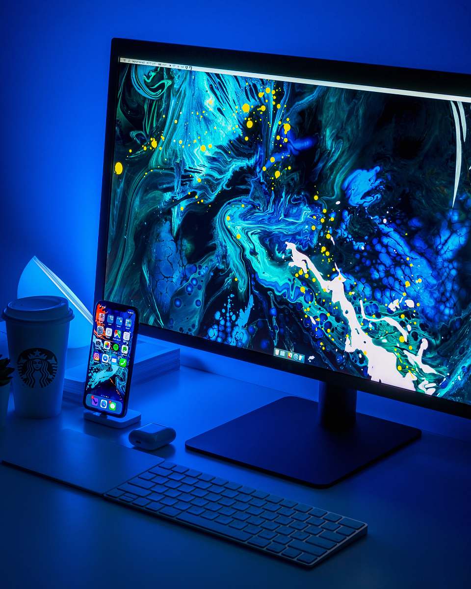 screen flat screen computer monitor turned on beside black keyboard display
