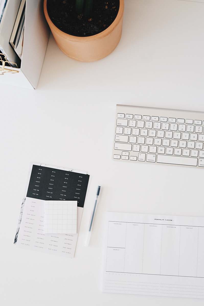 keyboard Apple wireless keyboard on white surface calendar