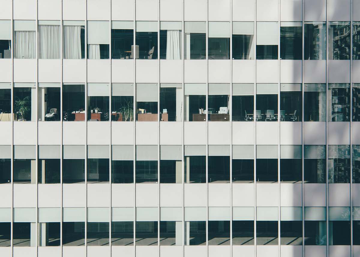 building white concrete building windows