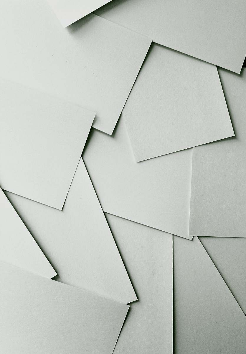 white Scattered sheets of white paper covering the entire frame texture