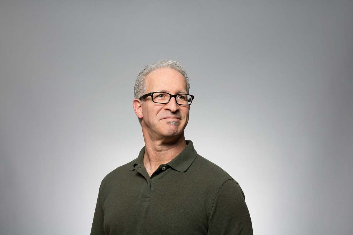 portrait man wearing green polo shirt man