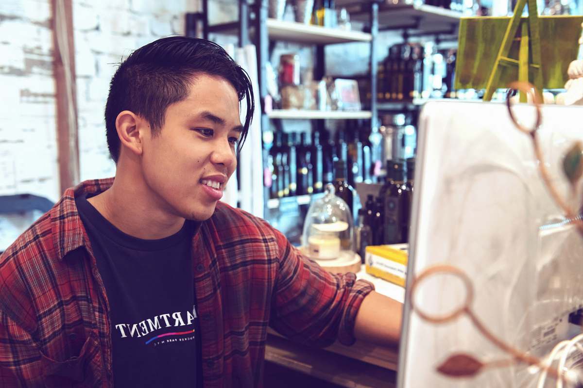 human man wearing red and black plaid top person
