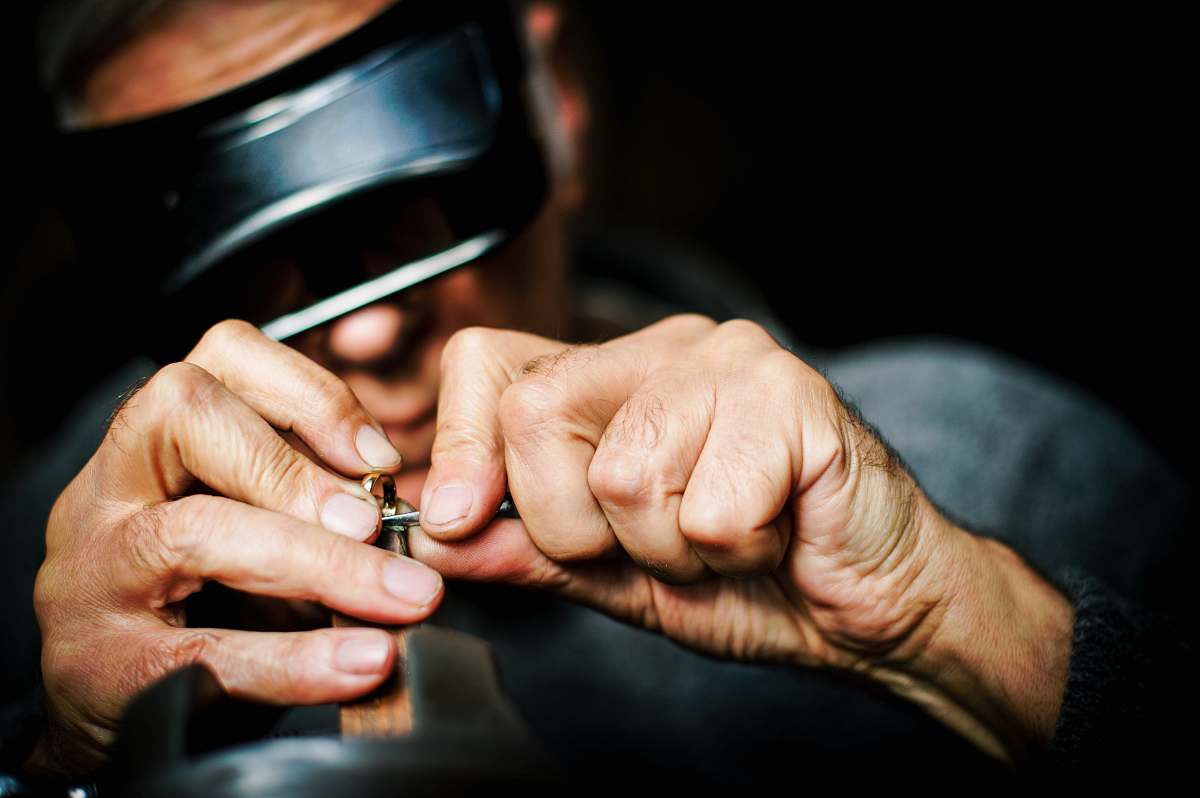 person person holding metal tool human