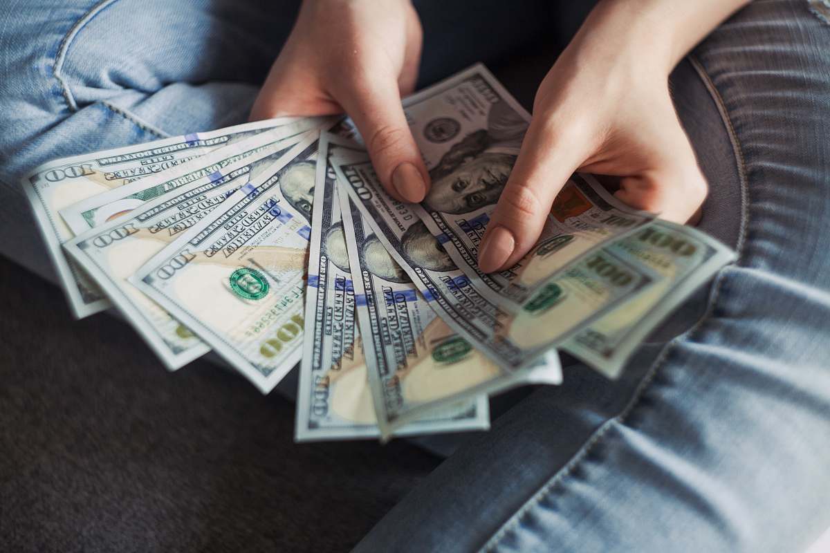 money fan of 100 U.S. dollar banknotes banking