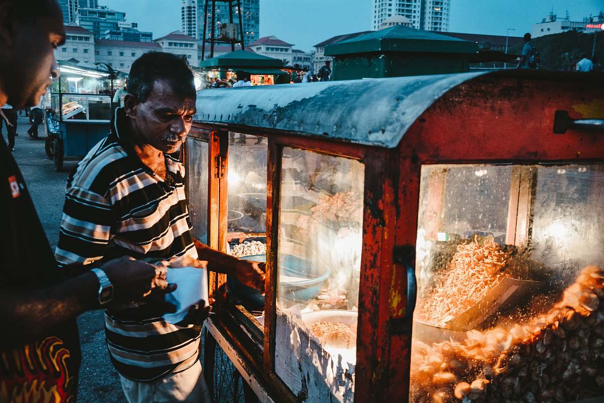 human man selling popcorn food