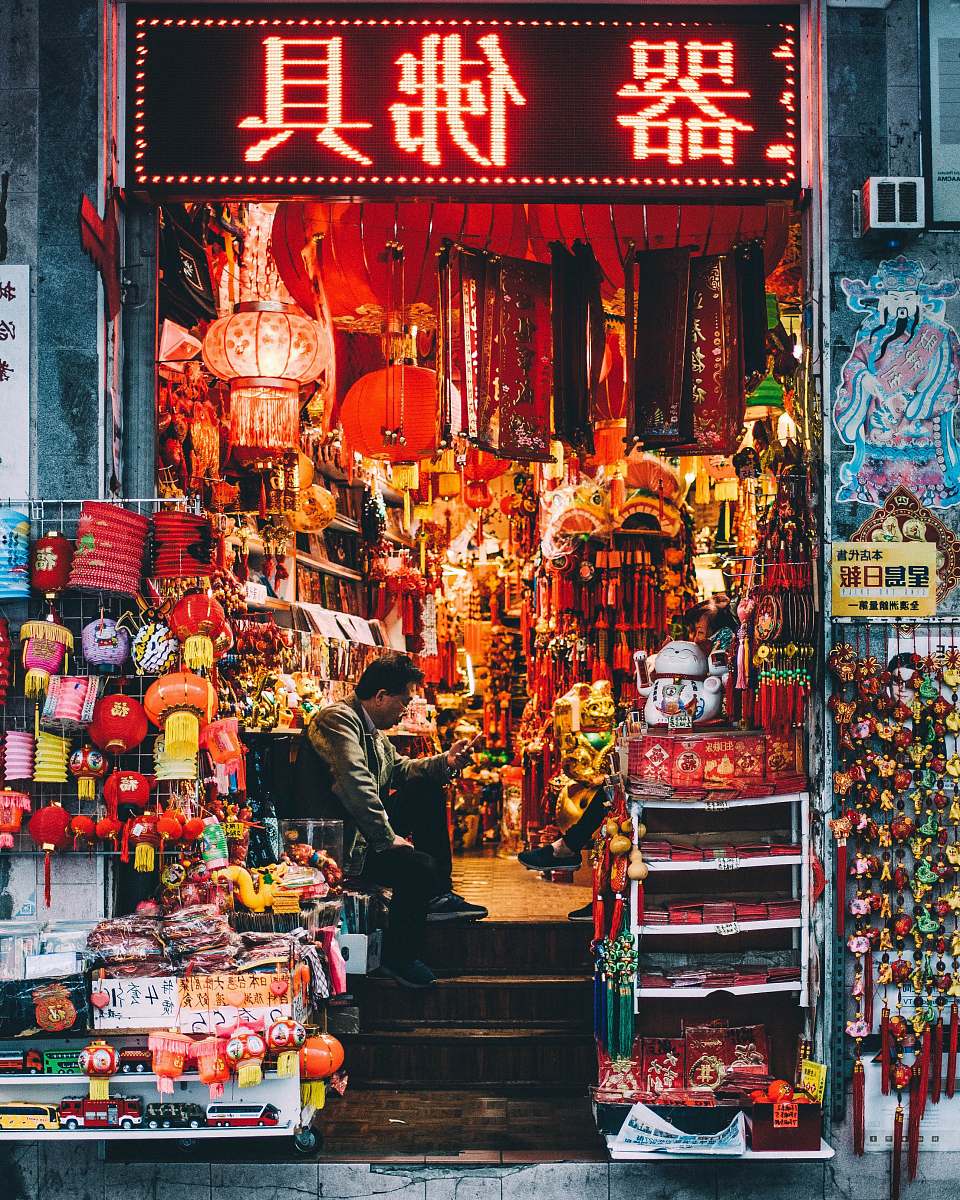 human man sitting inside store china