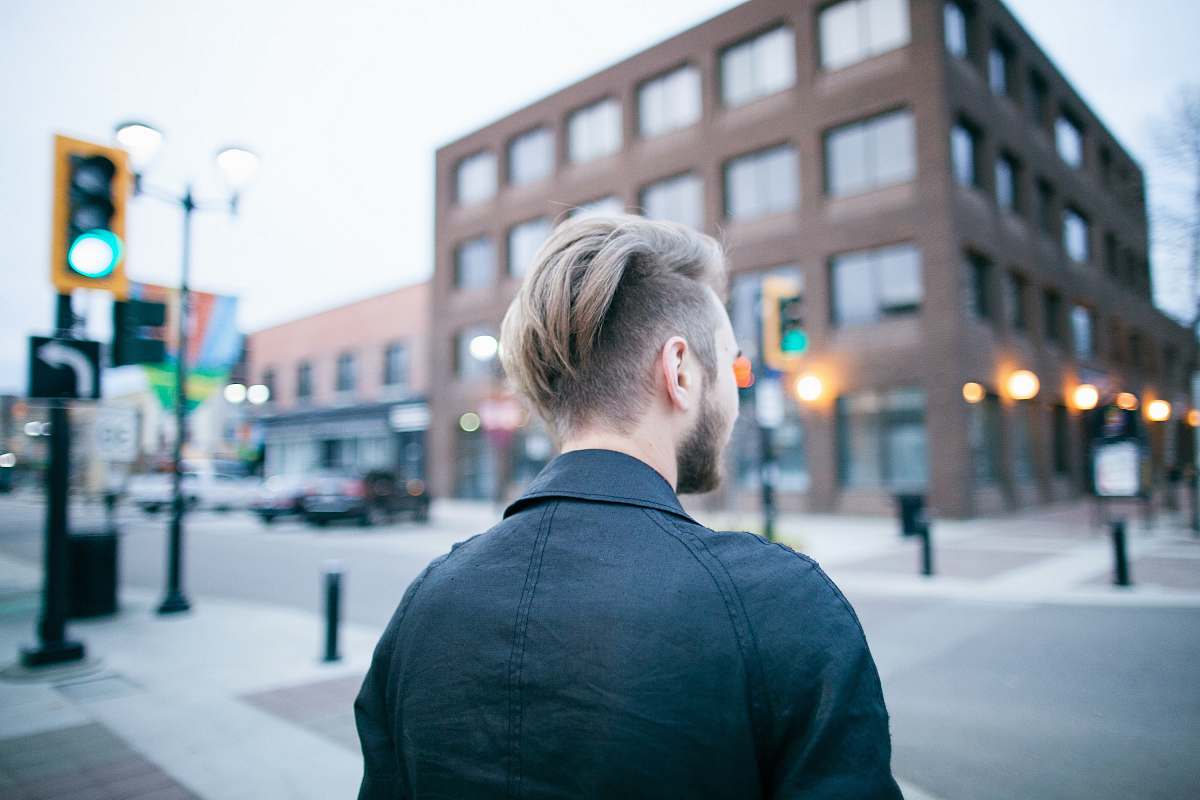 people man standing on street human