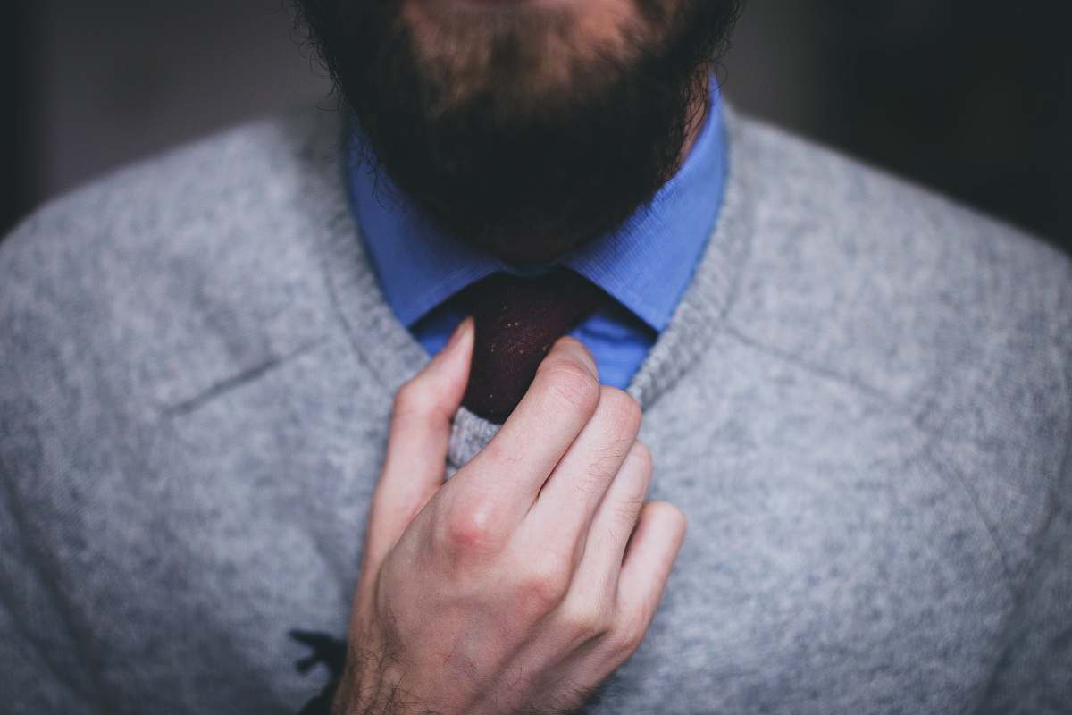 human man wearing gray sweater people