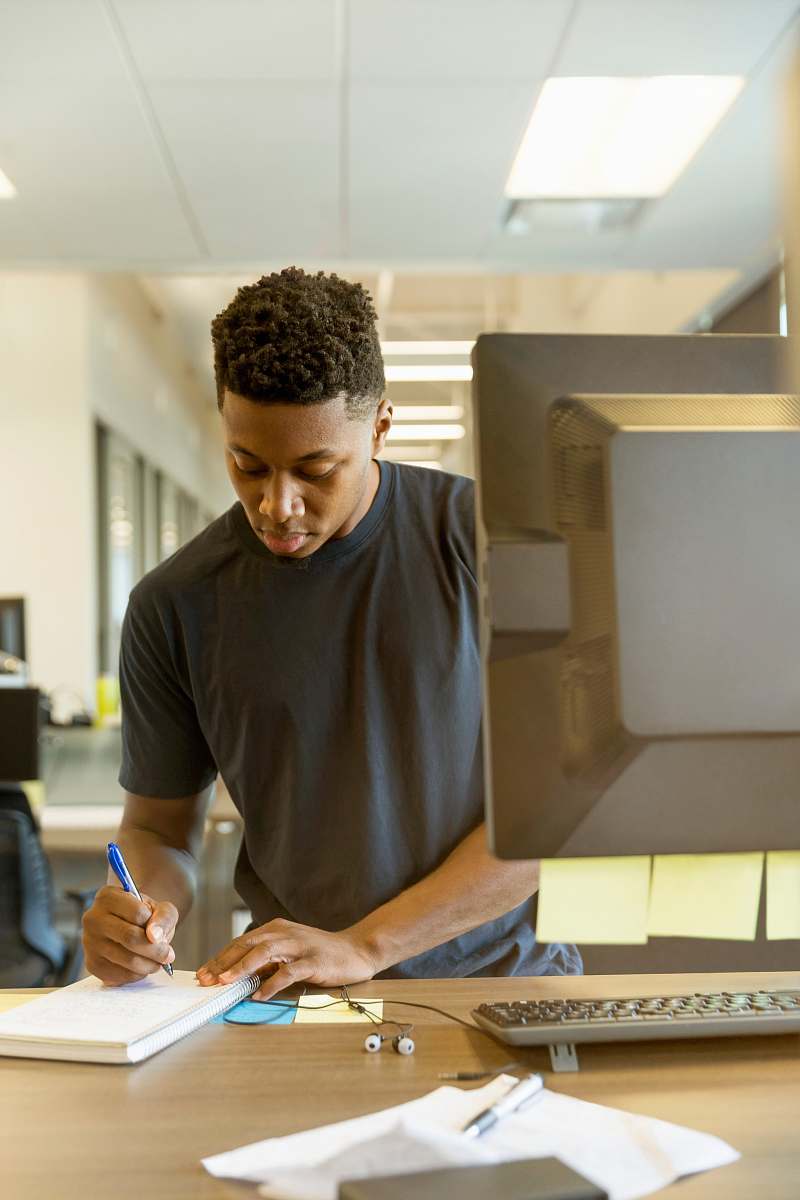 people man writing on white paper human