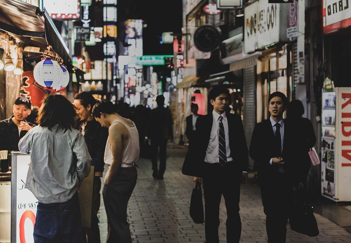 human people on street during night people