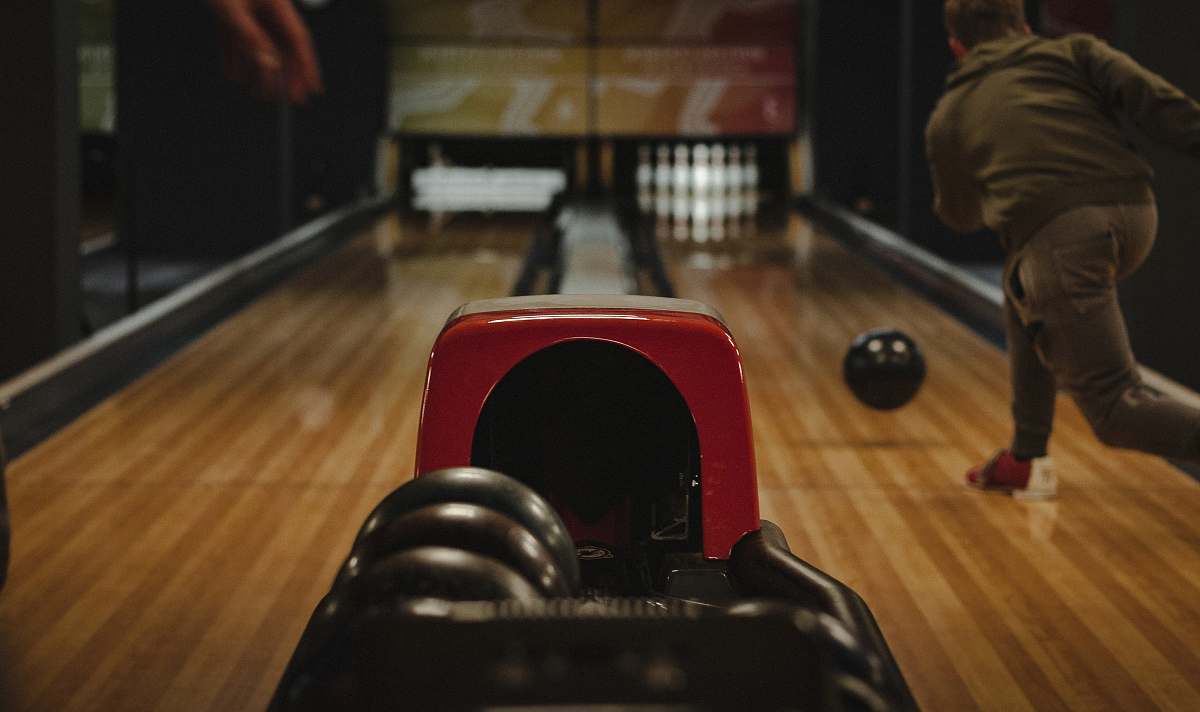 human person playing bowling bowling