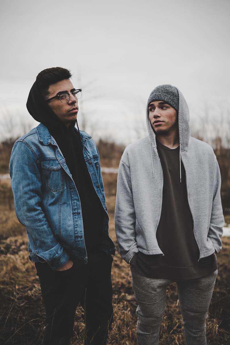 human two man standing on grass field people