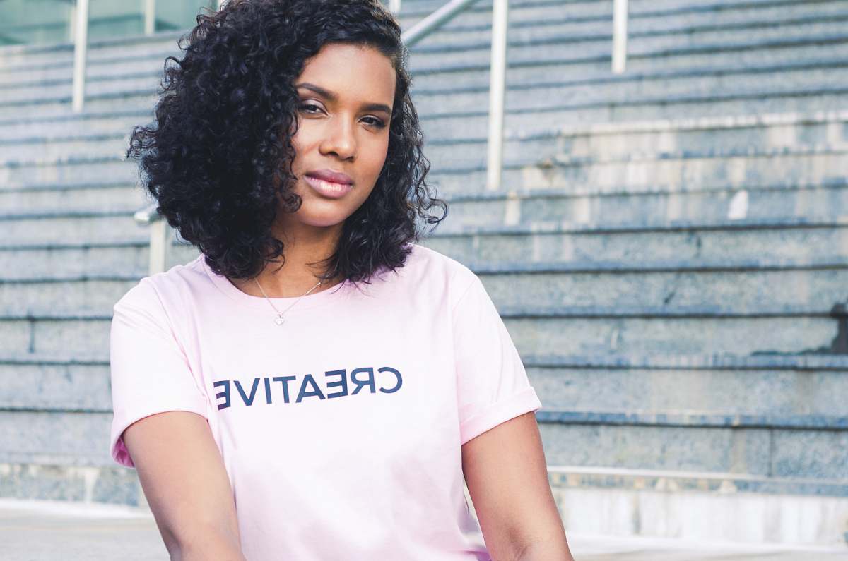 human woman wearing white Creative crew-neck shirt hair