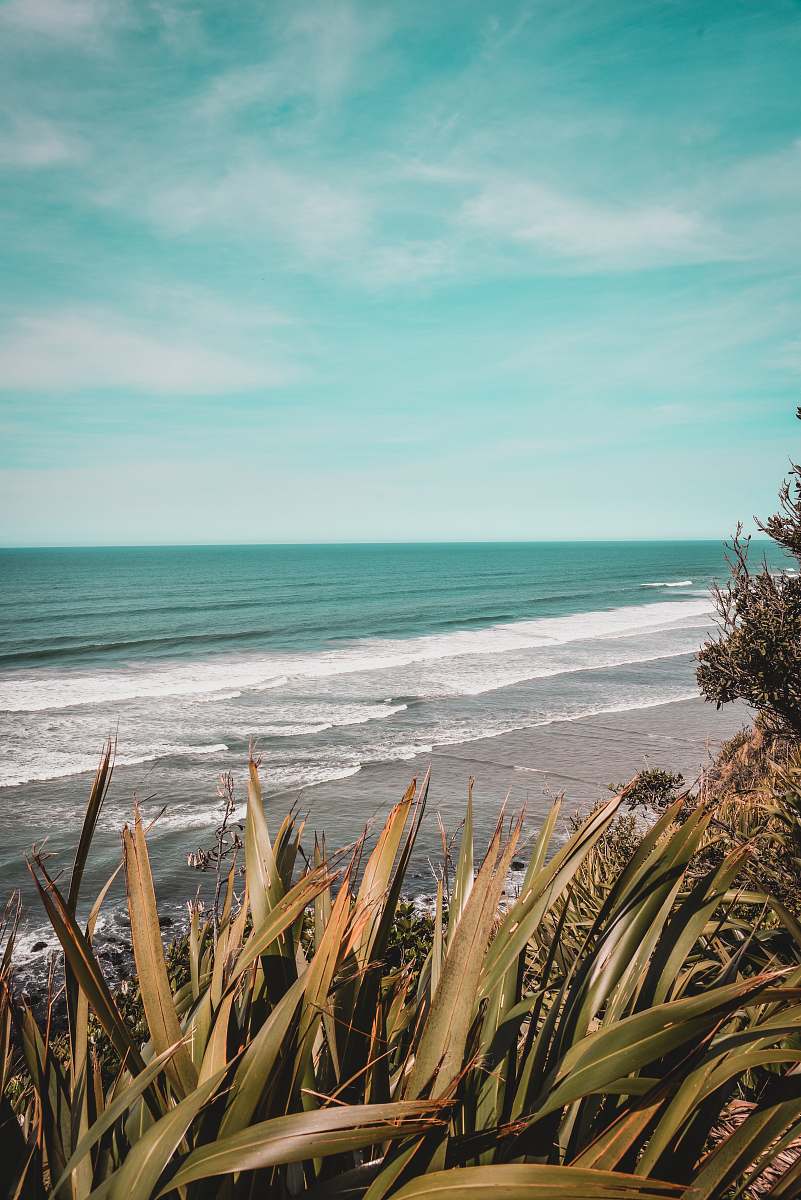 promontory time-lapse photography of waves splashing on seashore nature