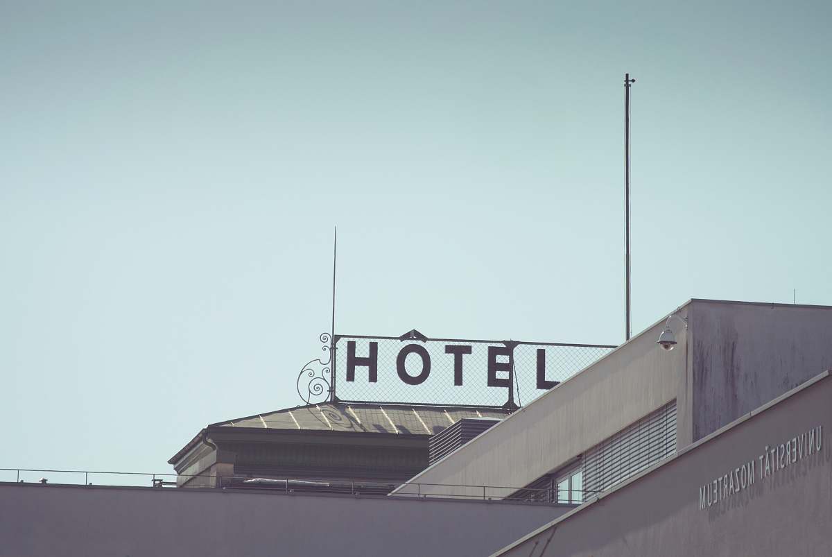 austria gray concrete building under gray sky sign