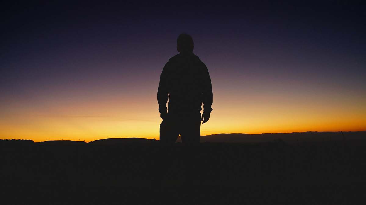 human silhouette of man during sunset people