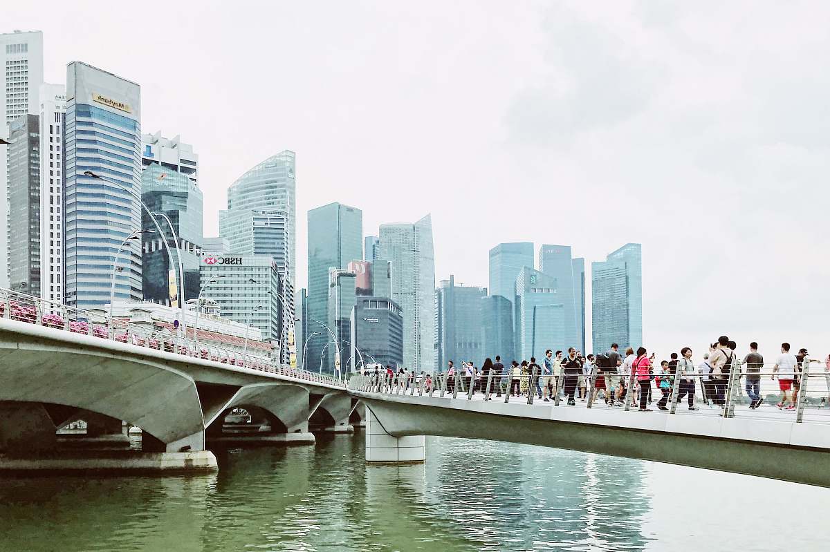 bridge people waking on bridge during daytime building