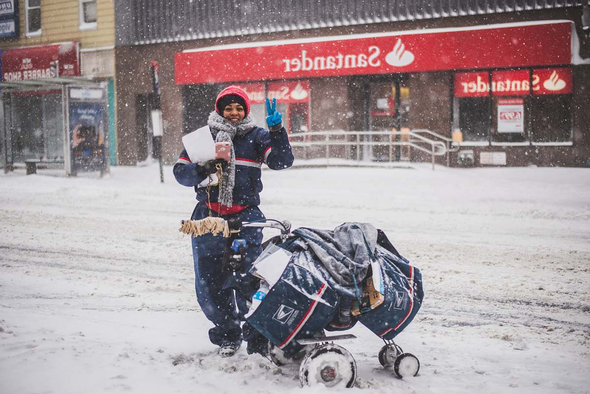 winter person standing beside stroller storm