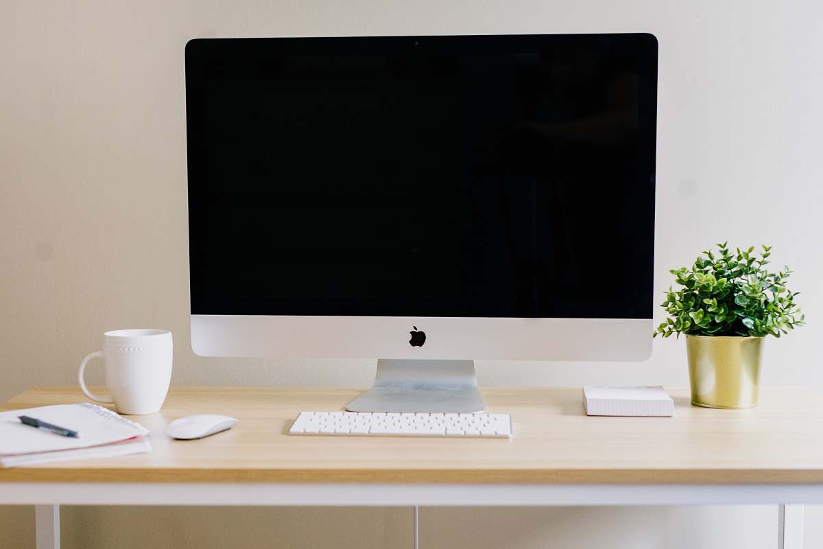 furniture silver iMac, Apple Magic Keyboard, and Apple Magic Mouse desk