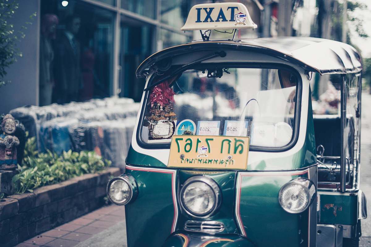asia green auto rickshaw taxi