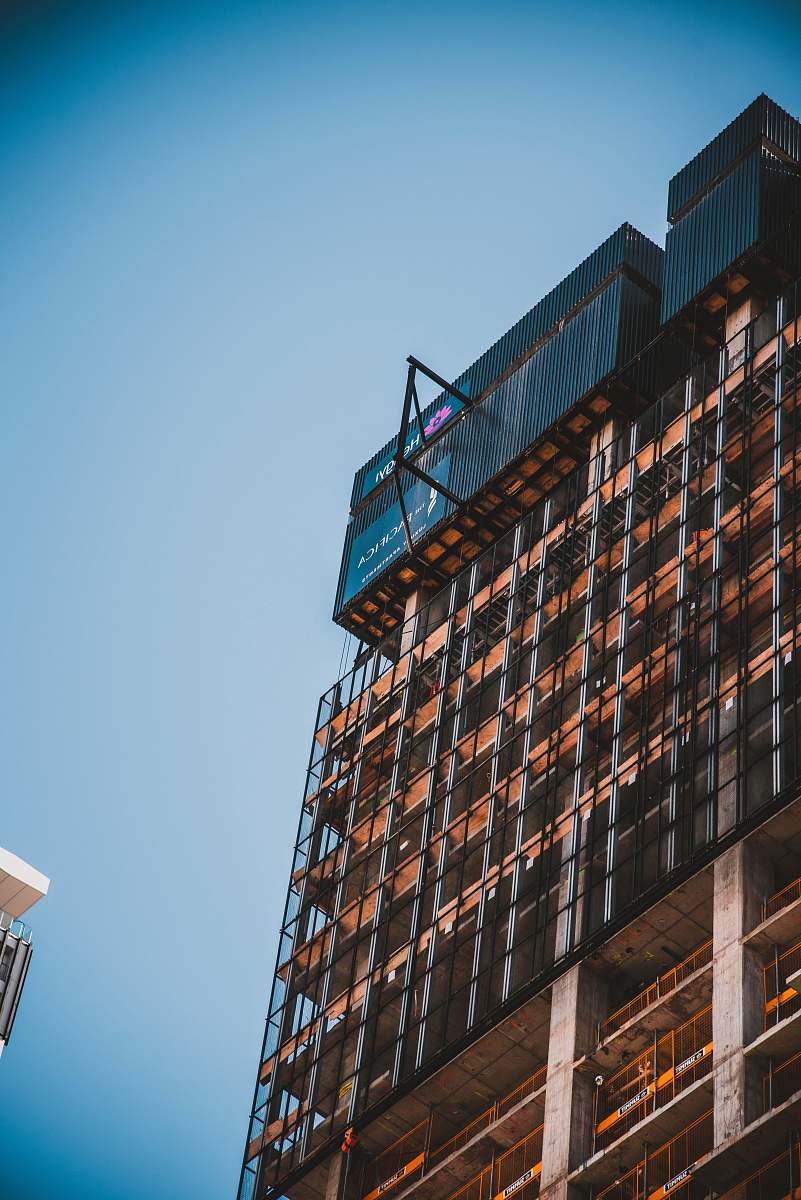 building brown and grey high rise building city