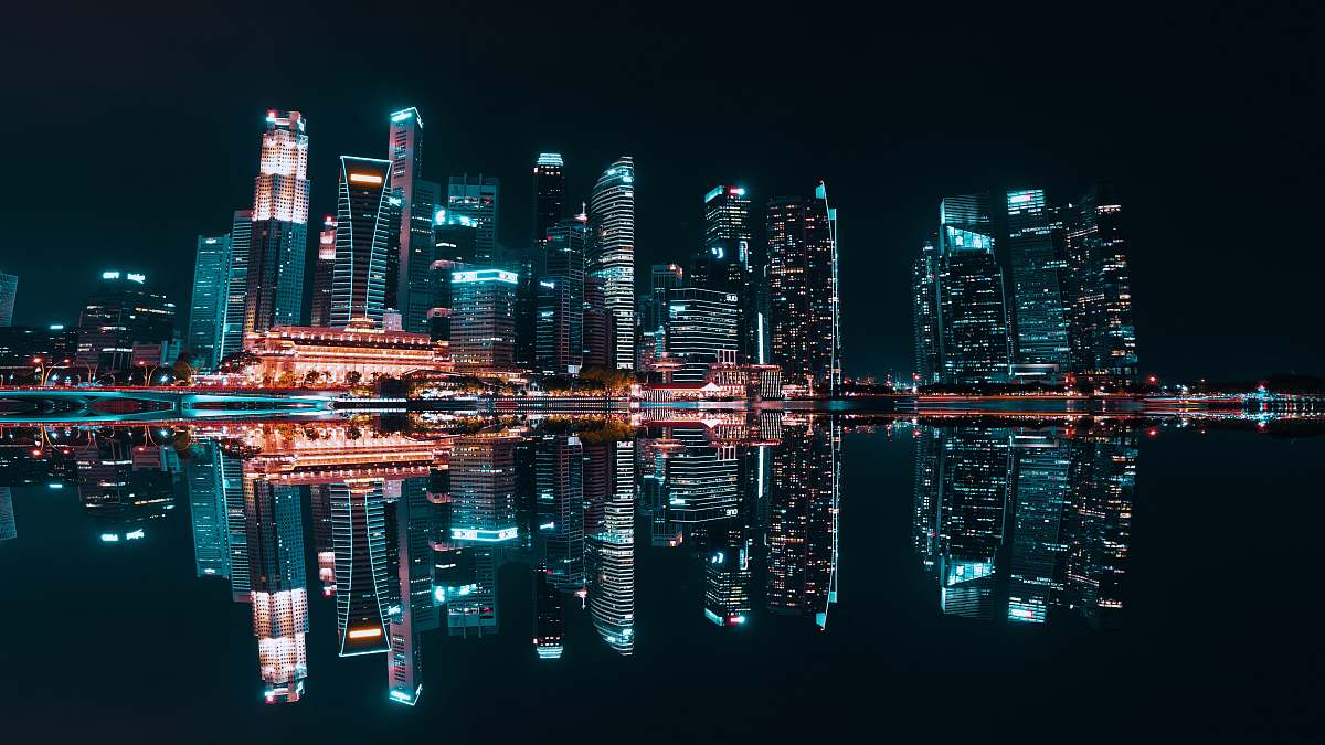 building lighted buildings during night time high rise