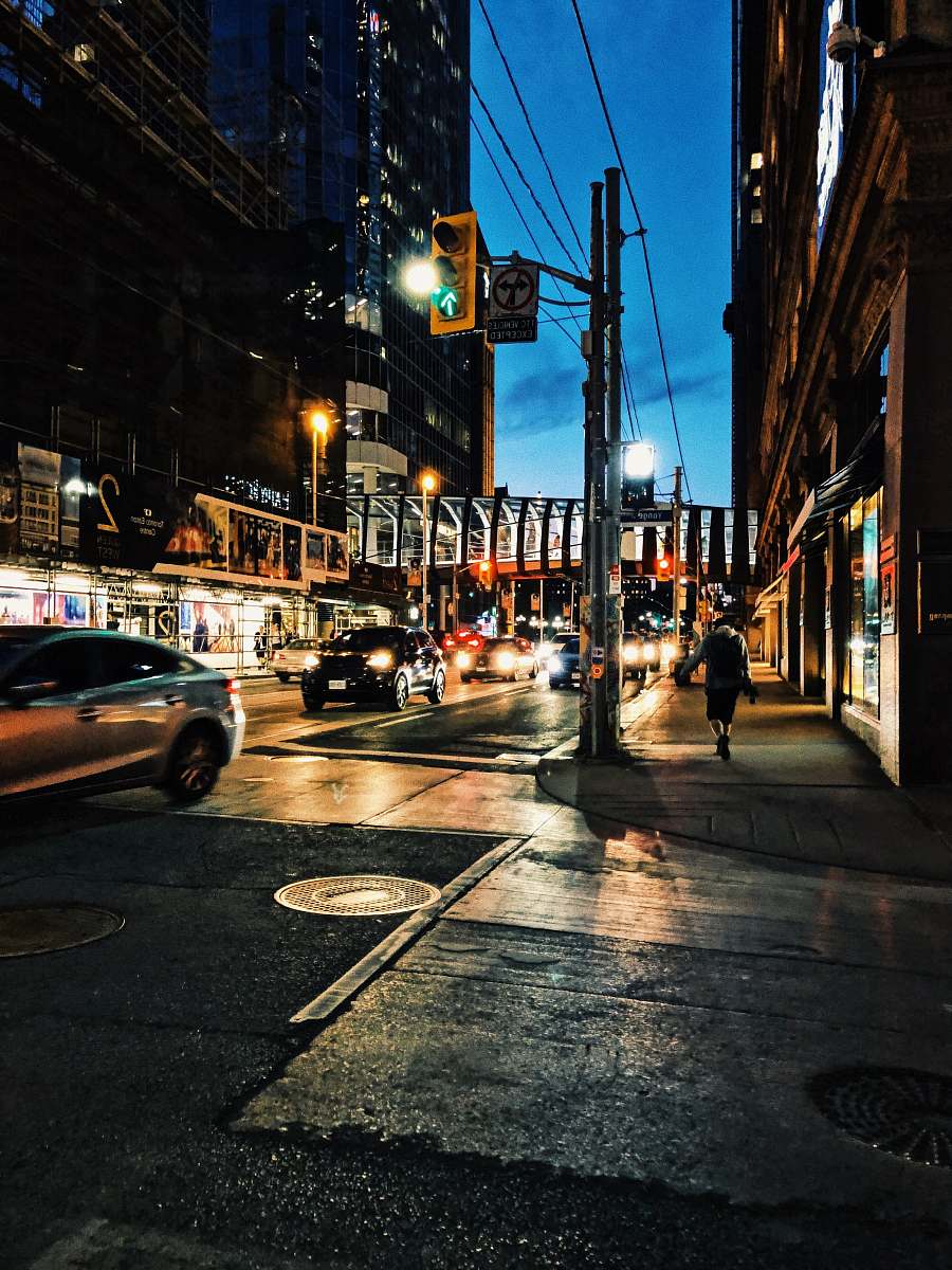 car vehicles passing by busy city street during nighttime automobile