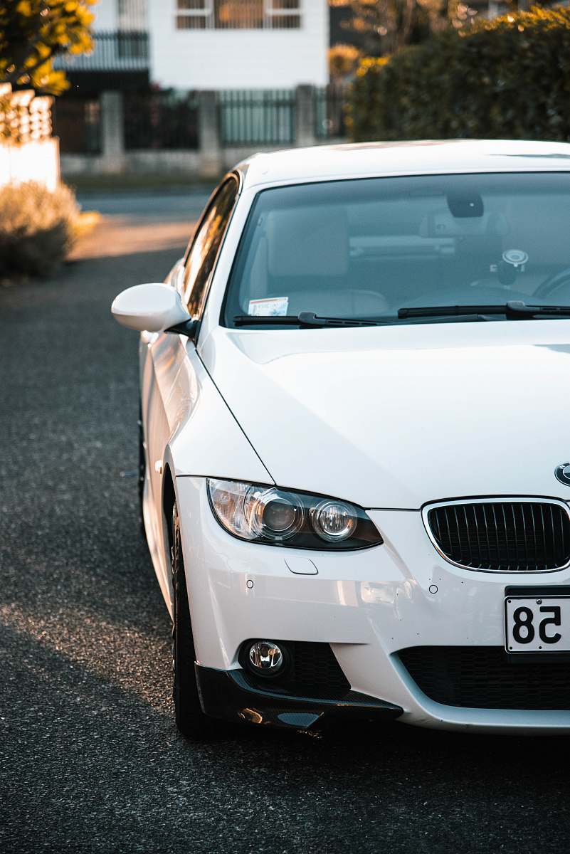 car white BMW car automobile