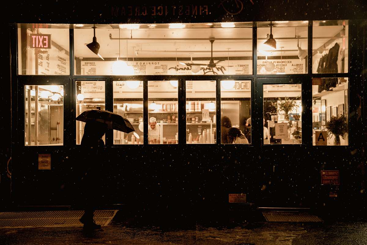 canopy person standing in front of restaurant new york