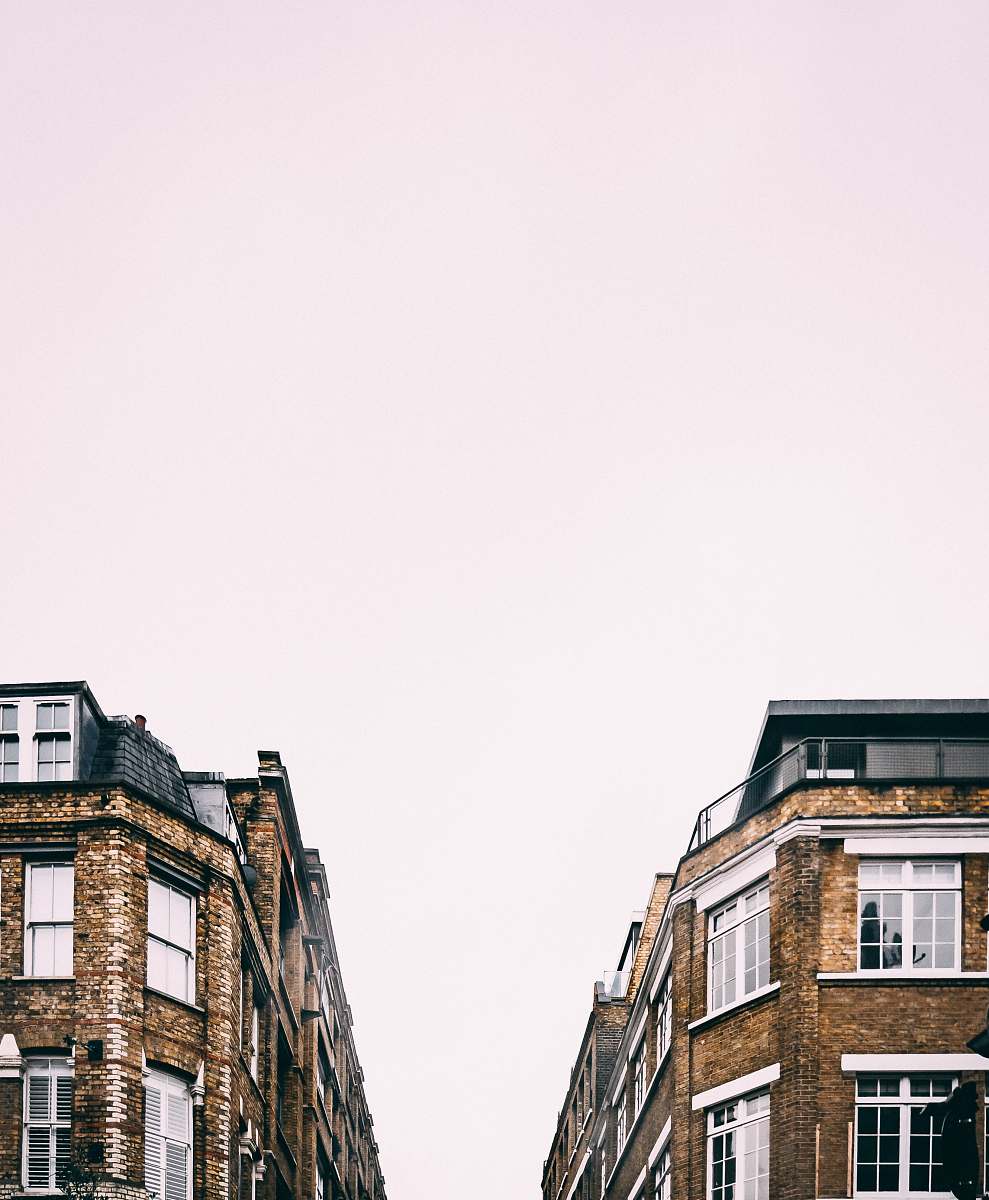 city brown and black high-rise buildings building
