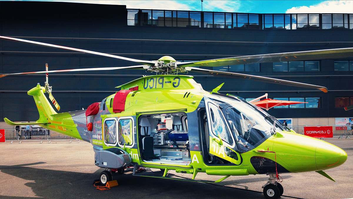 aircraft green helicopter on ground helicopter