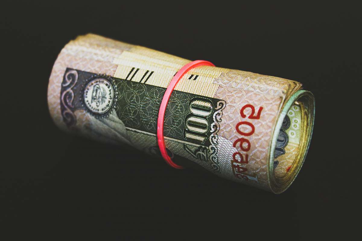 fund rolled banknotes money