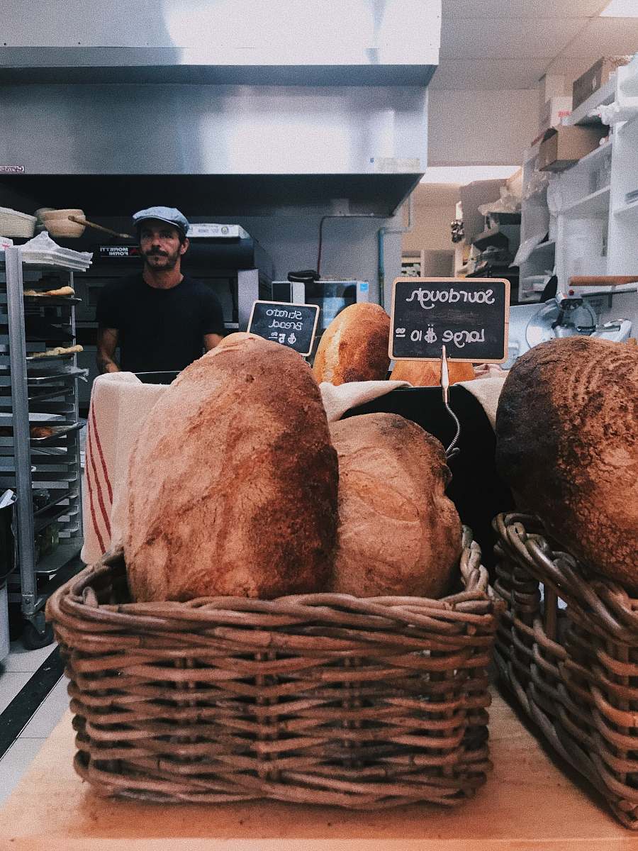 food baked bread on baskets human
