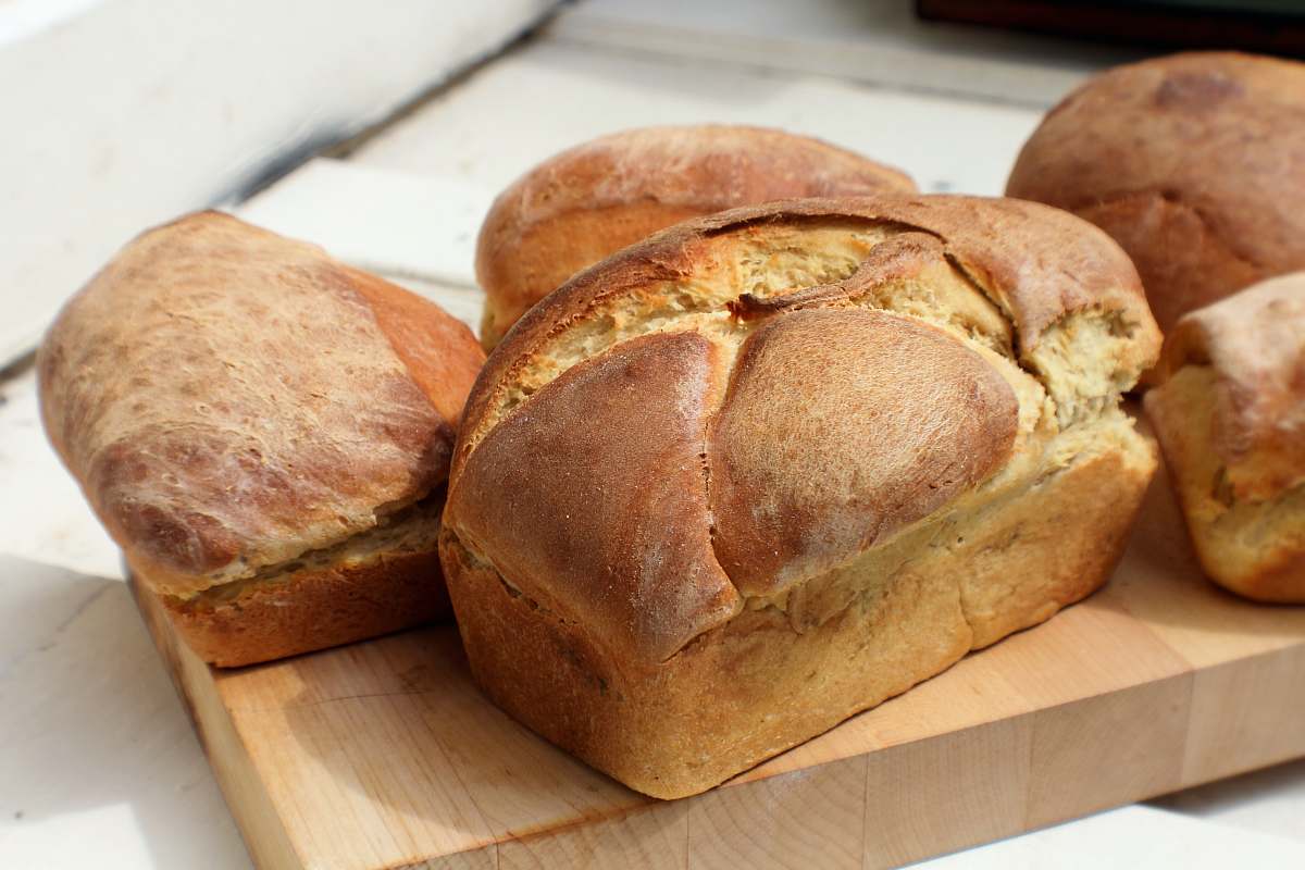 food bread on brown wooden tray loaf
