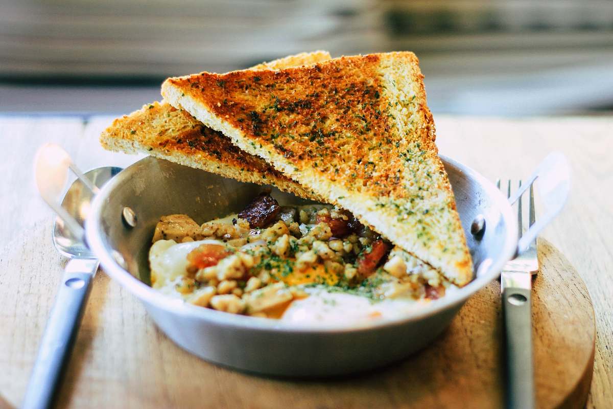 food two sliced toast on gray bowl cornbread