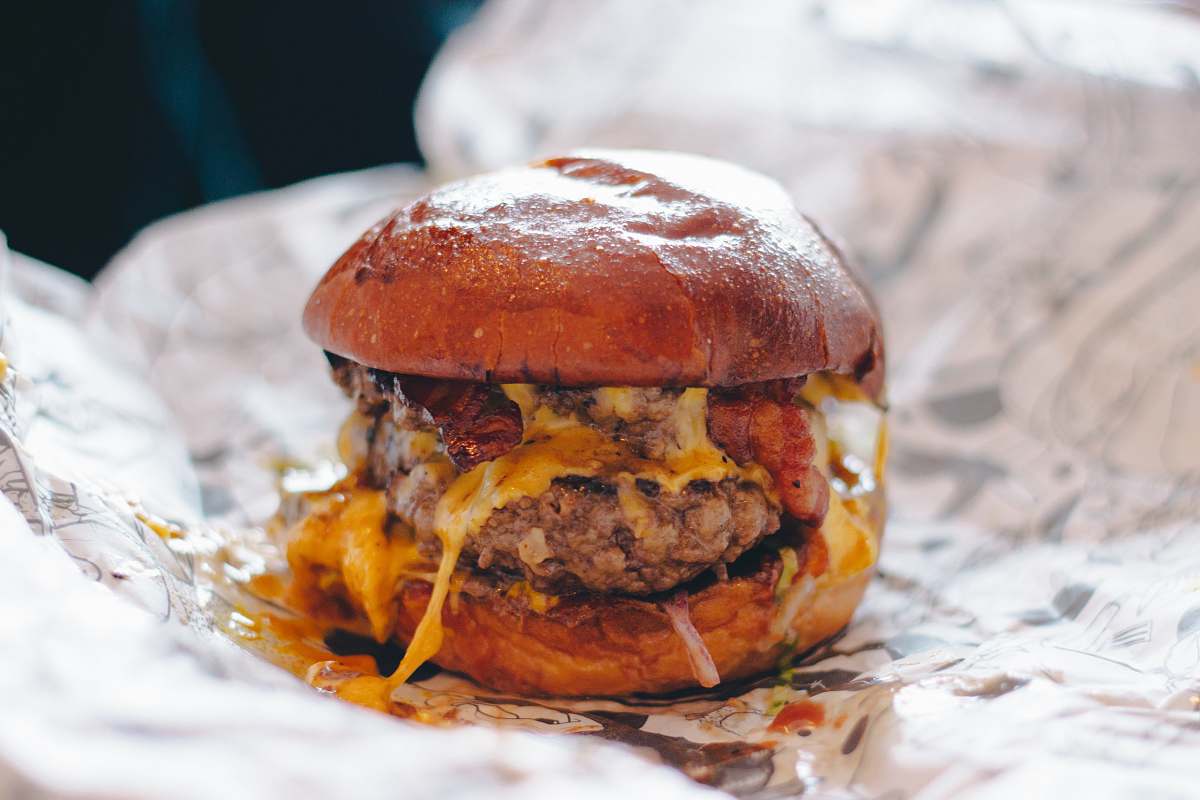 food burger with cheese on white paper birmingham