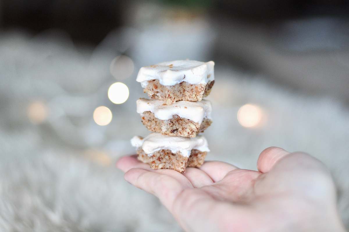 food three cake on top of hand sweets