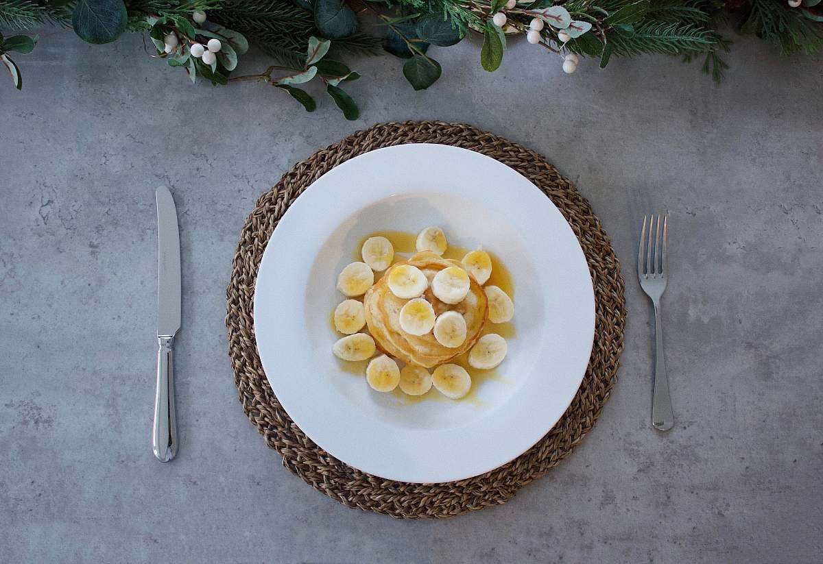 fork plate of dessert between table knife and fork dish