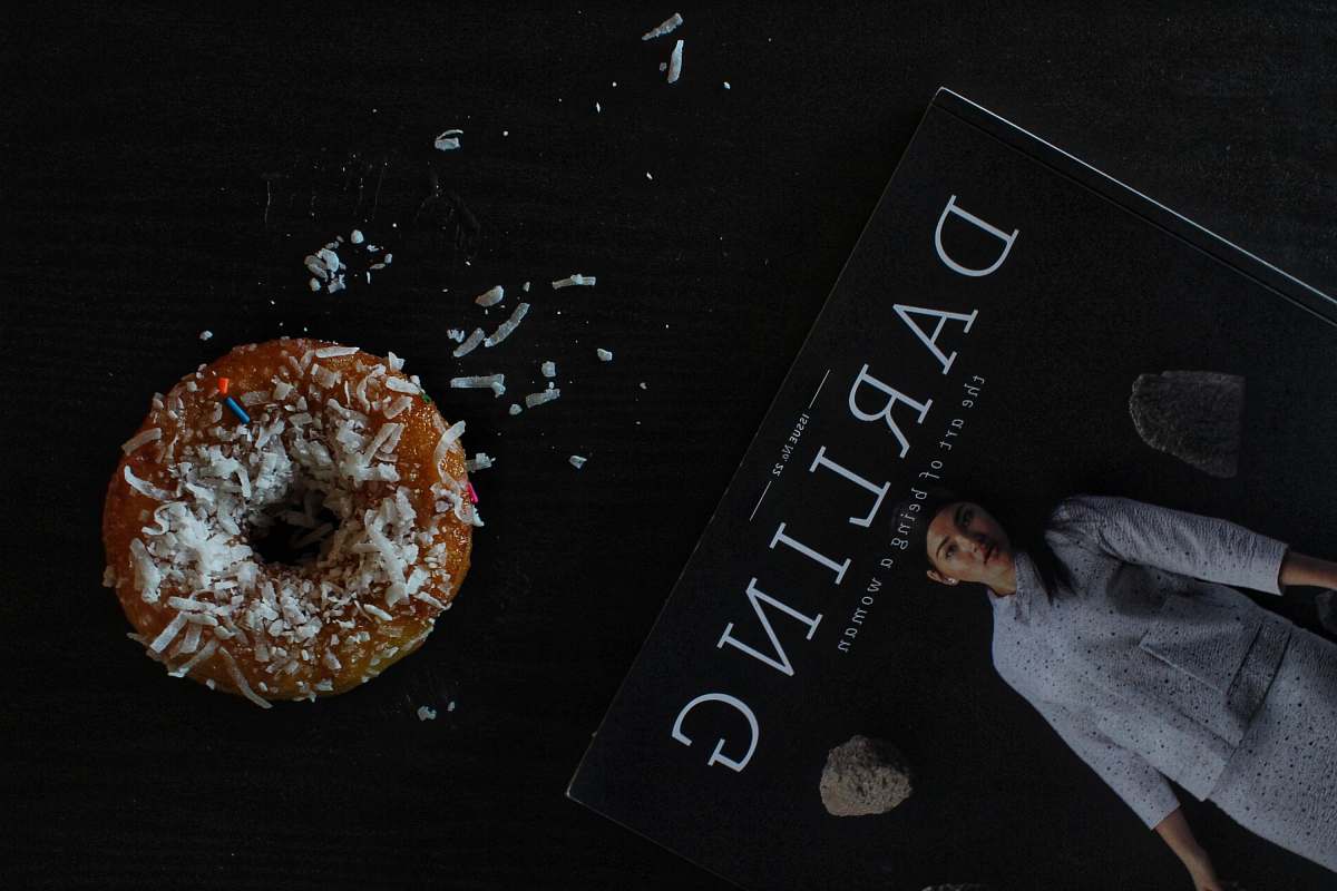 food Darling book on black surface donut