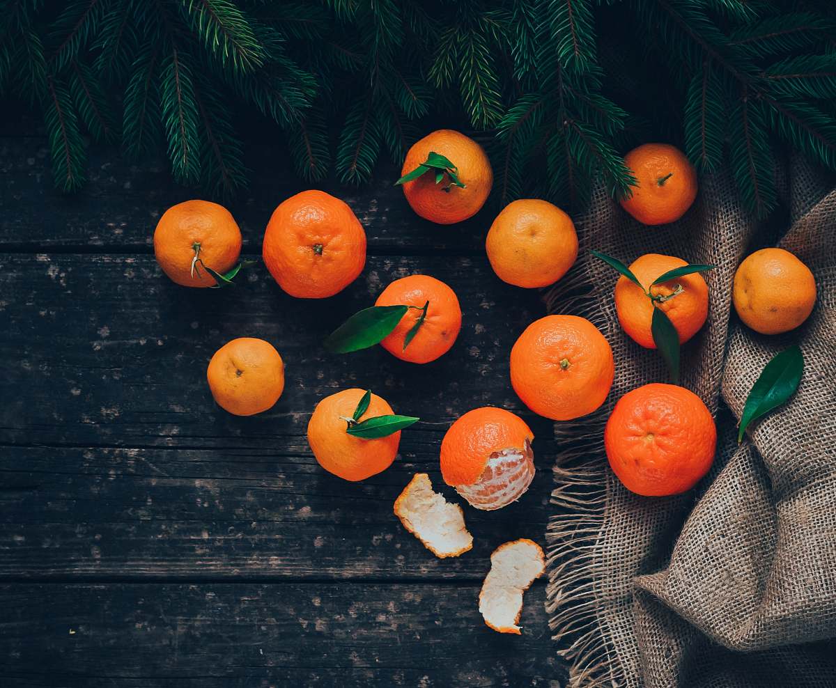 fruit 13 oranges on black textile citrus fruit