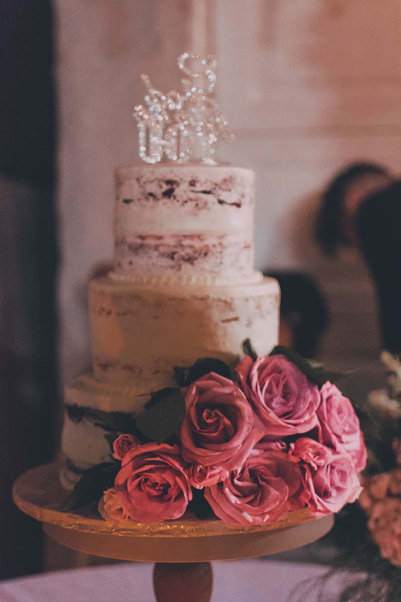cake 3-layer cake with rose accent dessert