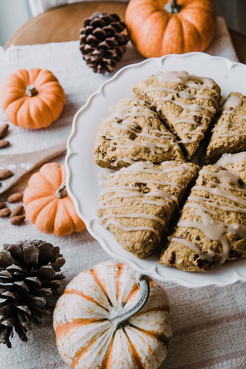 pumpkin baked cookies on white ceramic plate squash
