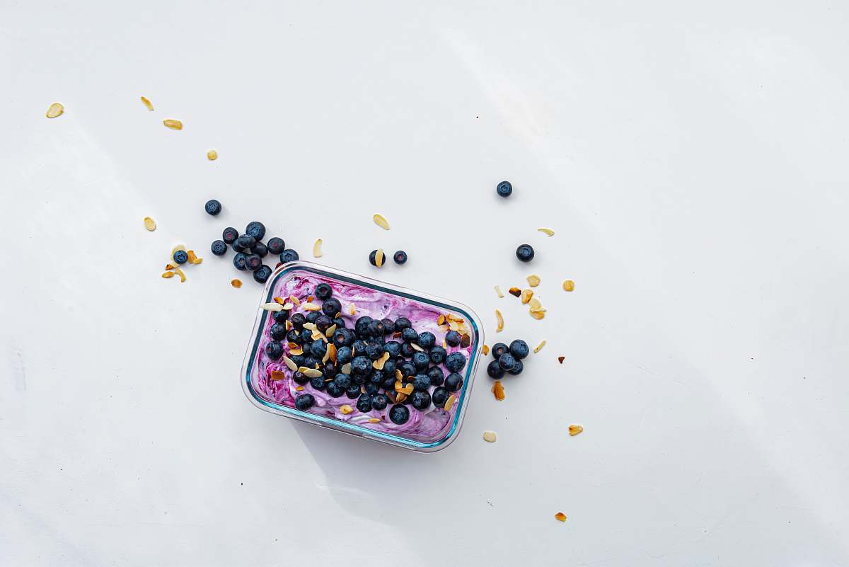 fruit black berries on pink container blueberry