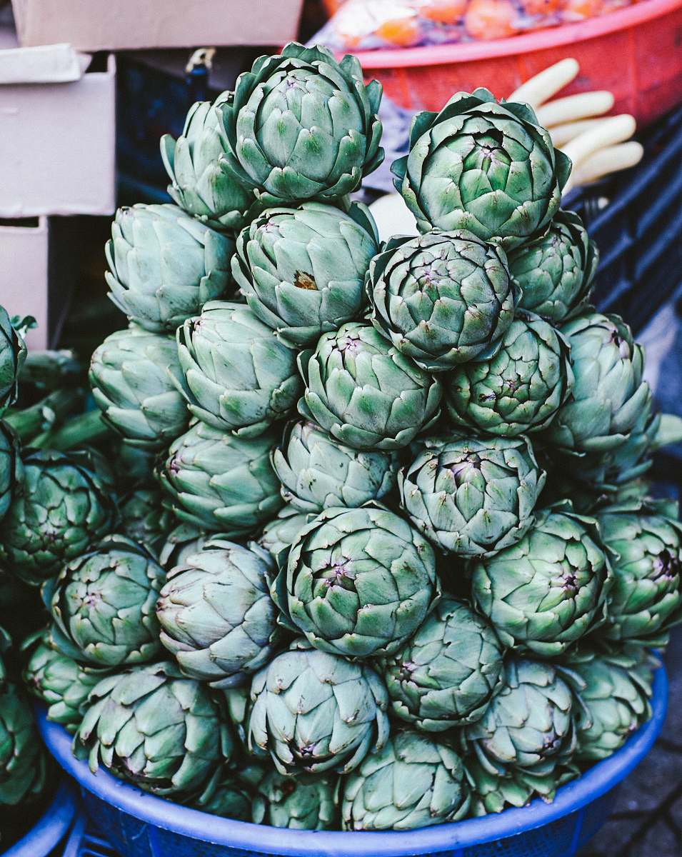produce bowl of pine cones artichoke