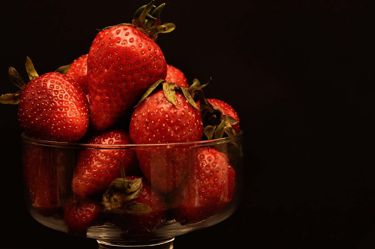 fruit bowl of red strawberries plant