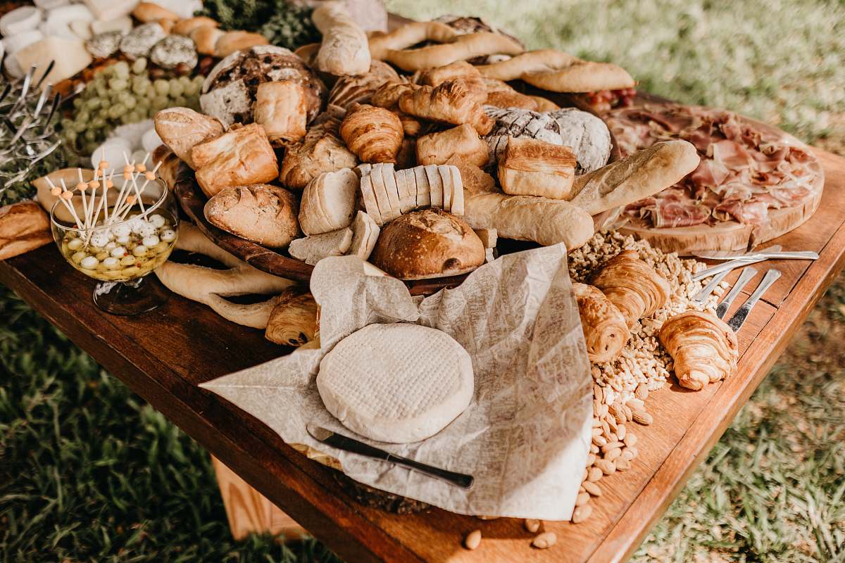 Bread Bread On Brown Wooden Table Outdoors Bakery Image Free Photo