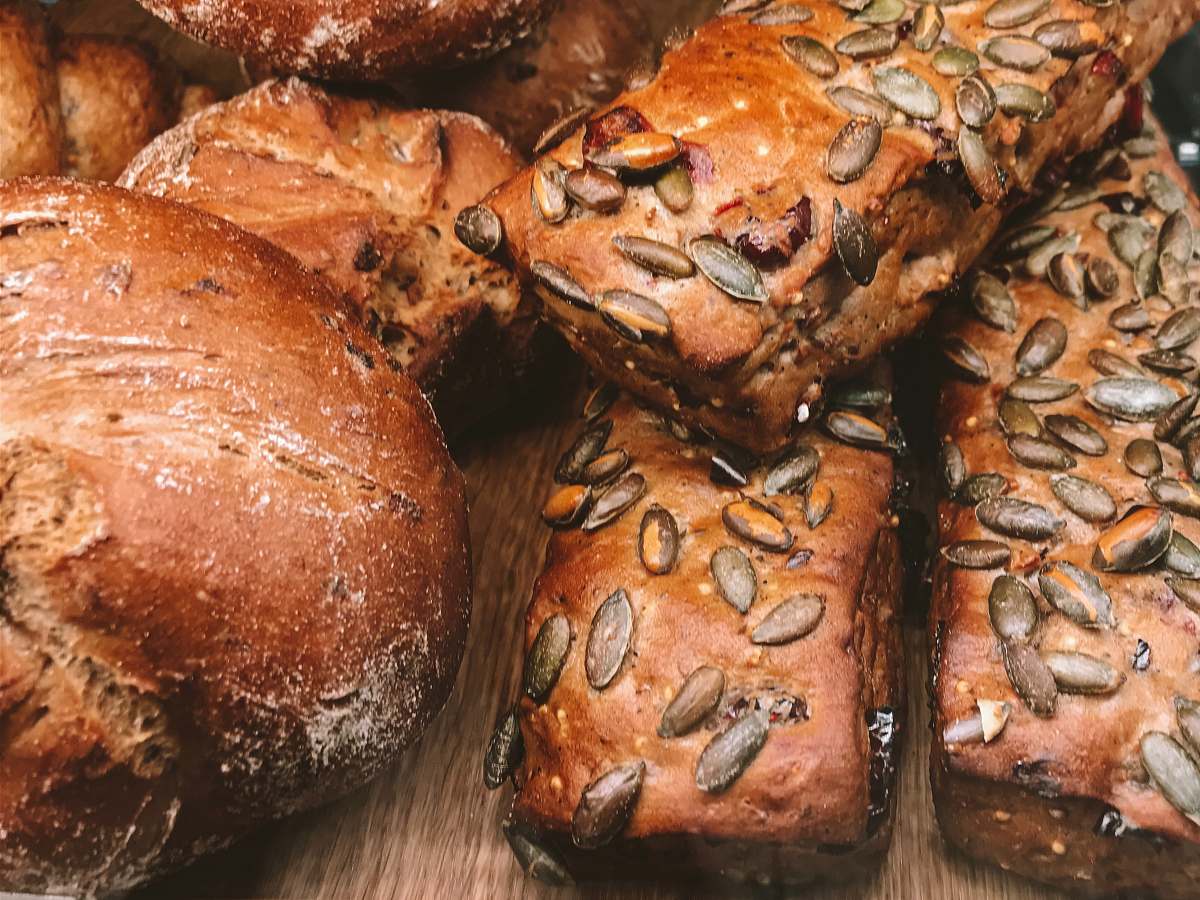 bread breads on brown wooden surface bun