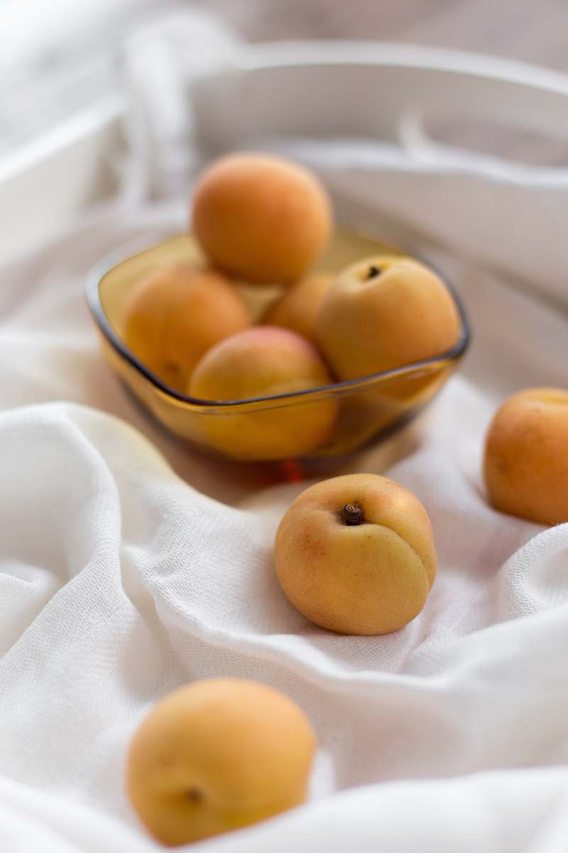fruit bunch of fruits in clear glass bowl peach